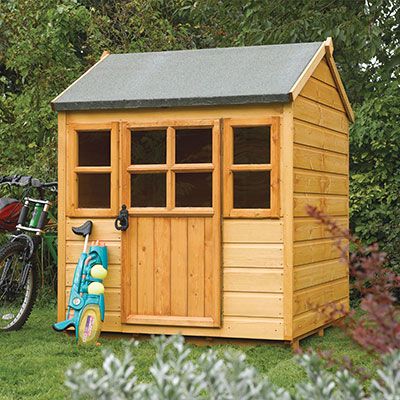 a small, wooden kids' playhouse
