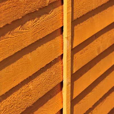 overlap cladding on a ip-treated wooden shed