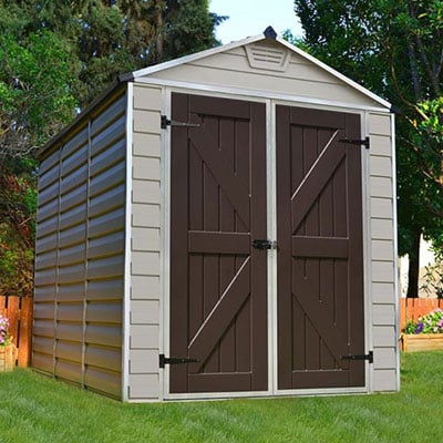 a tan-coloured plastic shed with an apex roof and brown double doors