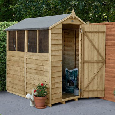a cheap wooden shed with 4 windows