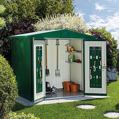 a green metal shed with double doors, containing garden tools and equipment