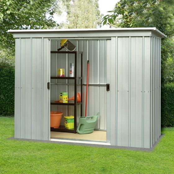 a  white metal pent shed with open sliding doors in a garden setting with tools visible inside