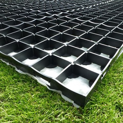 close up of a section of plastic grid shed base