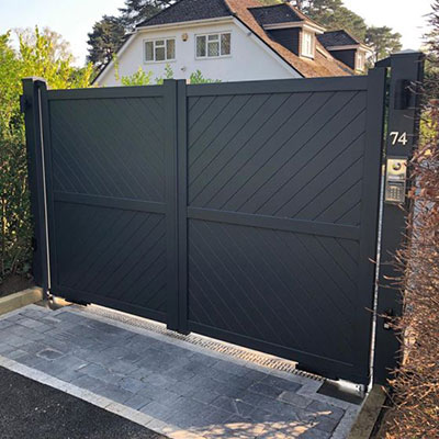 grey driveway double gates with a diagonal infill