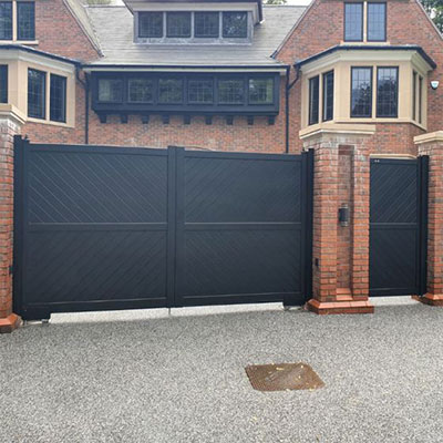 black aluminium double swing gates and a matching side gate