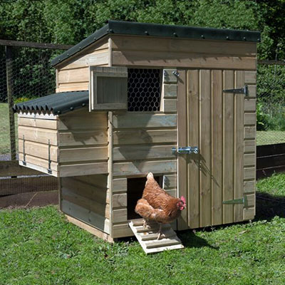 a wooden hen house made from shiplap cladding