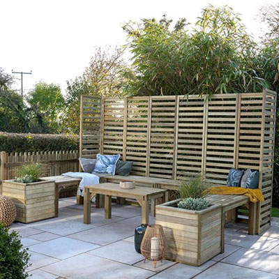 a garden seating set, including benches, tables, wooden planters and slatted panels