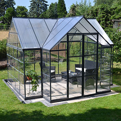 An orangery greenhouse on a concrete base