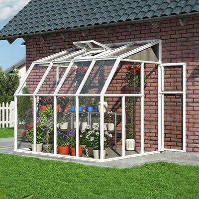 a lean-to sunroom with a white frame, single door and roof vent