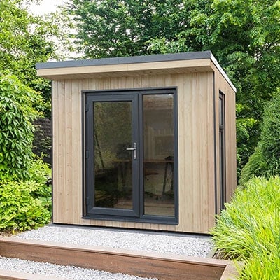 a garden office with a double-glazed door and 2 full-length windows