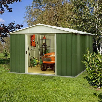 10x13 green and white metal shed with doors open to show mower and contents Yardmaster brand
