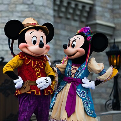 Mickey and Minnie Mouse in medieval costumes