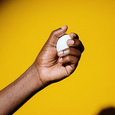 an egg in someone's hand