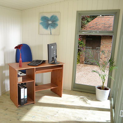 Interior of a log cabin used as a home office