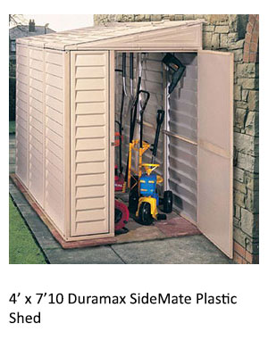 the 4’ x 7’10 Duramax SideMate Plastic Shed, door open revealing neatly stacked tools