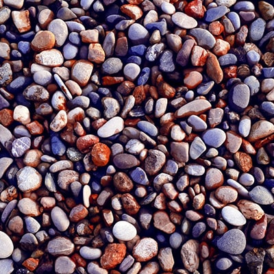 a pile of colourful gravel sized stones