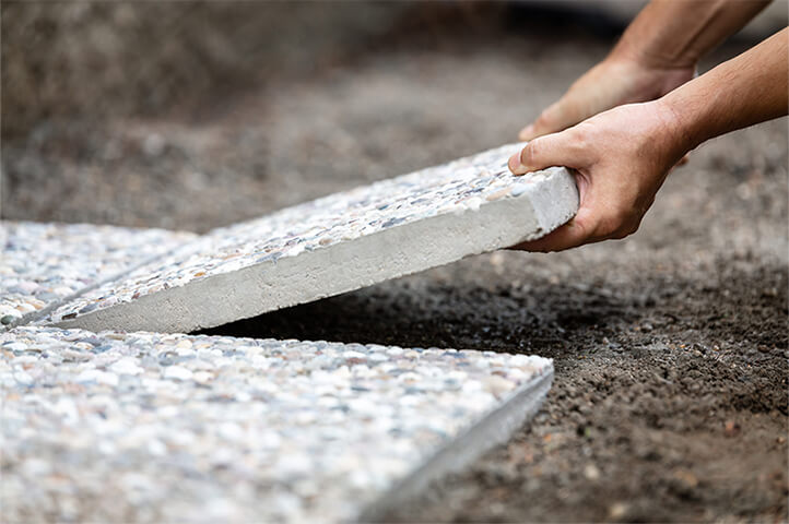 photo of someone laying slabs