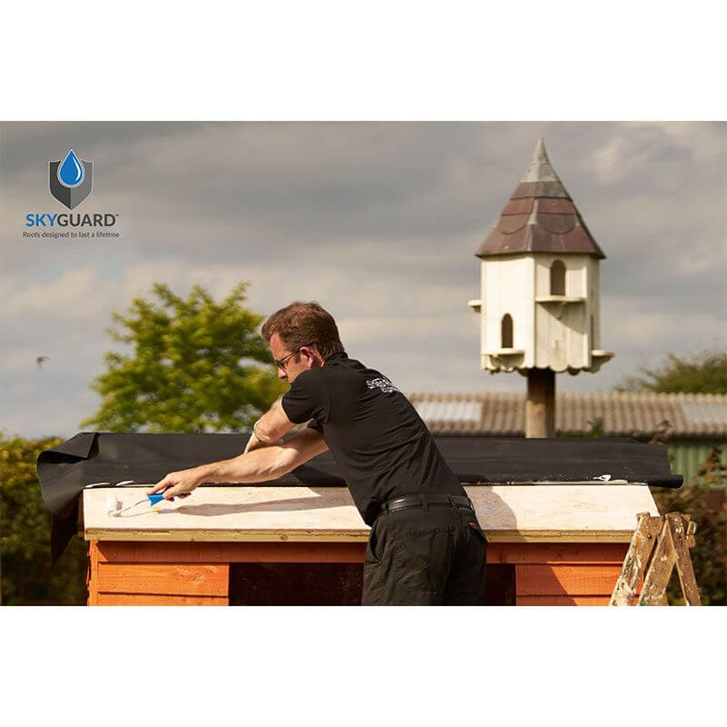 Photo of a Man Fitting a SkyGuard Shed Roof Kit - Click HERE to see our full range