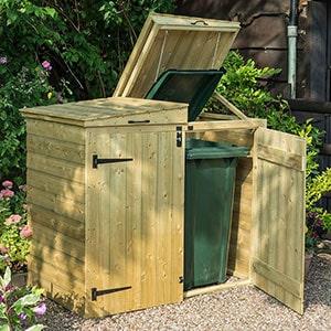 The 5'x2'7 Rowlinson Double Wheelie Bin Store, situated on a patio, with 1 door ajar.