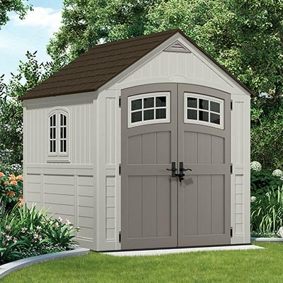A 7x7 taupe, brown and grey plastic shed
