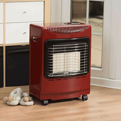 a small, red summer house heater