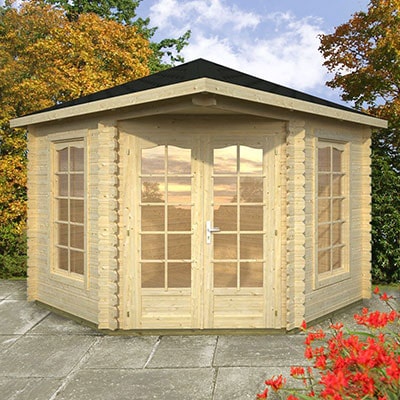 A cream corner summer house with glazed double doors and 2 full-length windows.