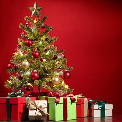presents underneath a Christmas tree