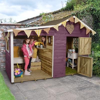 children in a purple wooden Wendy house with 2 rooms